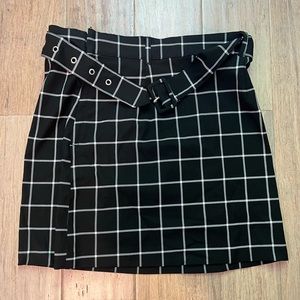 Black and white plaid skirt with belt